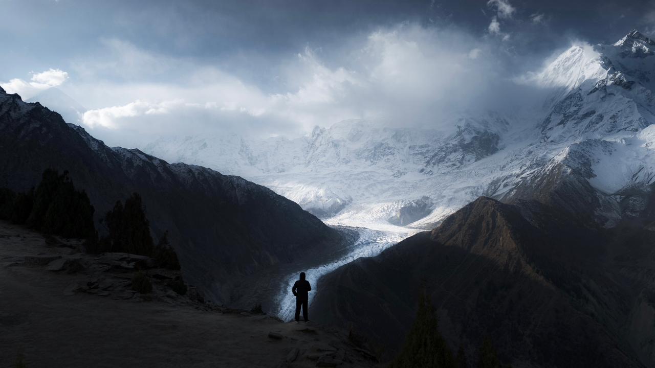 A wide view of the Skardu valley basin showing the Indus cutting through grey rock mountains