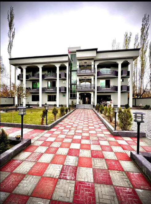 Entrance walkway leading to Arcadian Resort, a hotel in Katpana, Skardu